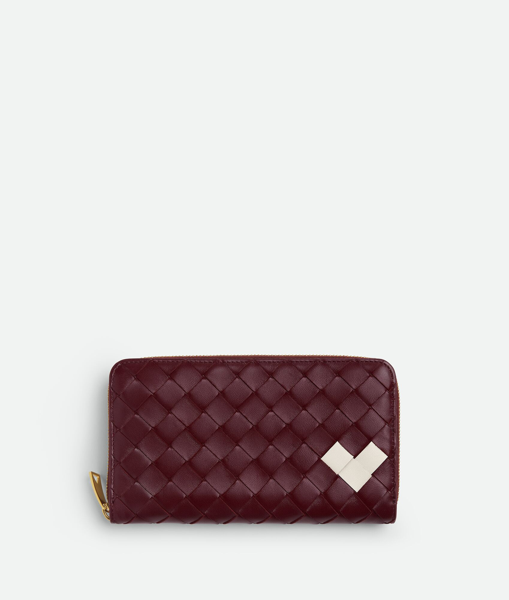 Bottega Veneta® Women's Intrecciato Zip Around Wallet in Barolo/chalk. Shop online now. | Bottega Veneta