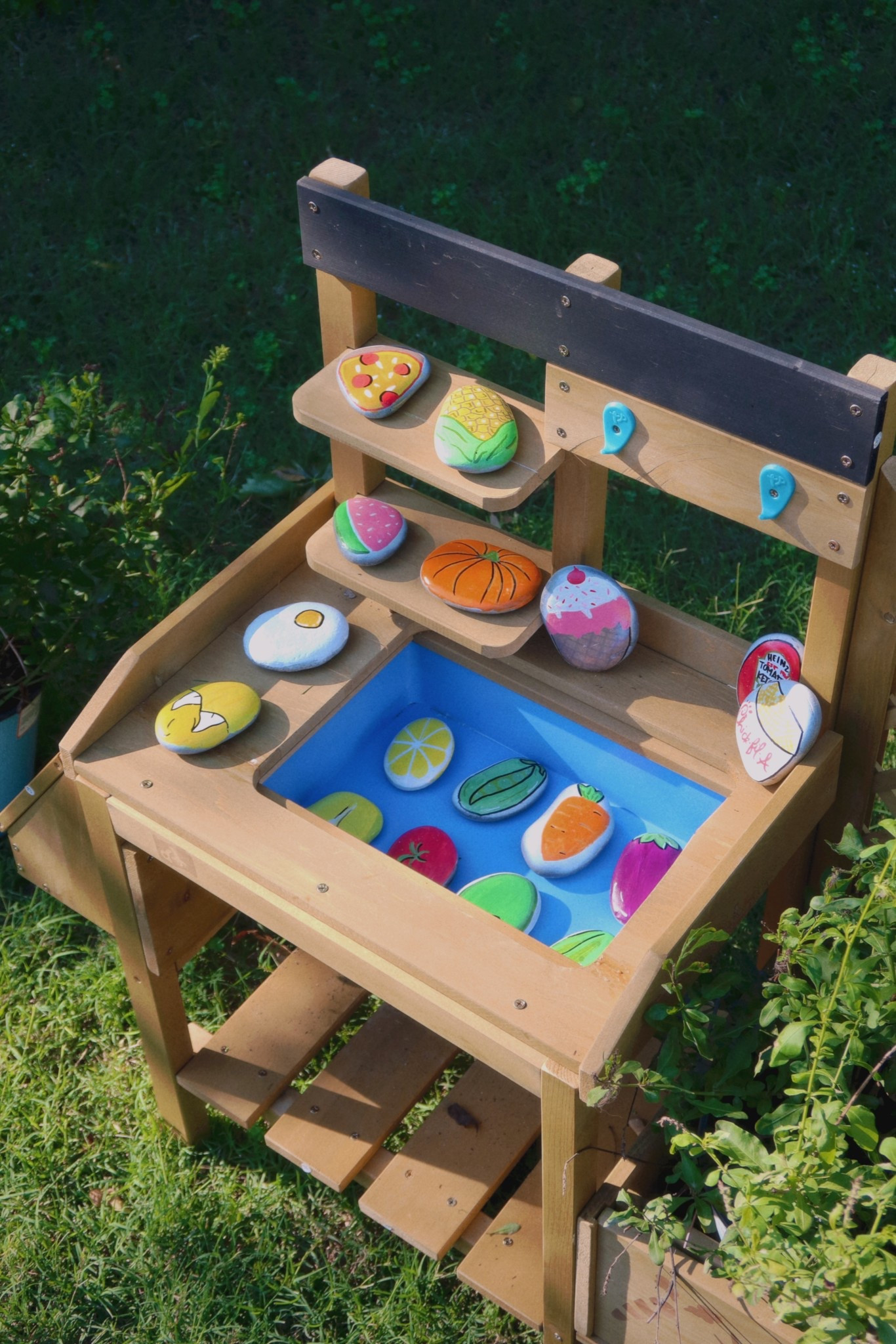 Toddler outdoor mud kitchen and painted food rocks 

#LTKKids #LTKSummerEdit #LTKFamily