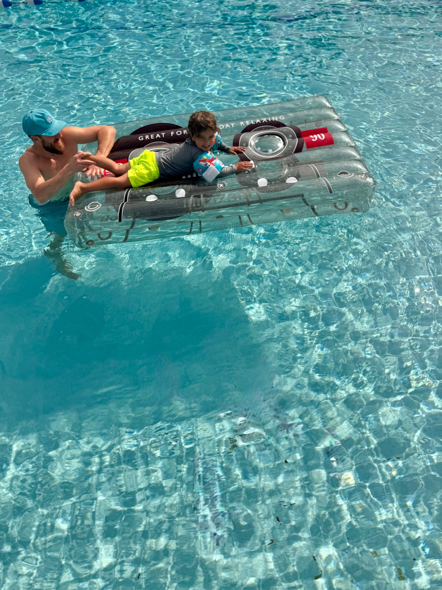 This float was an absolute HIT in Florida ☀️🌊

We had 4–5 kids piled on at once and it held up like a champ. Super sturdy, thicker material, and didn’t feel flimsy at all. Inflate with a pump and you’re good to go 👌🏼

There’s a big clip coupon right now — making them about $35 each (reg $49) on the 2-pack 👀

So fun… but I did have to explain to the kids what cassette tapes were 😂

Grab one for you and one to gift.

#LTKKids #LTKstorytime #LTKTravel