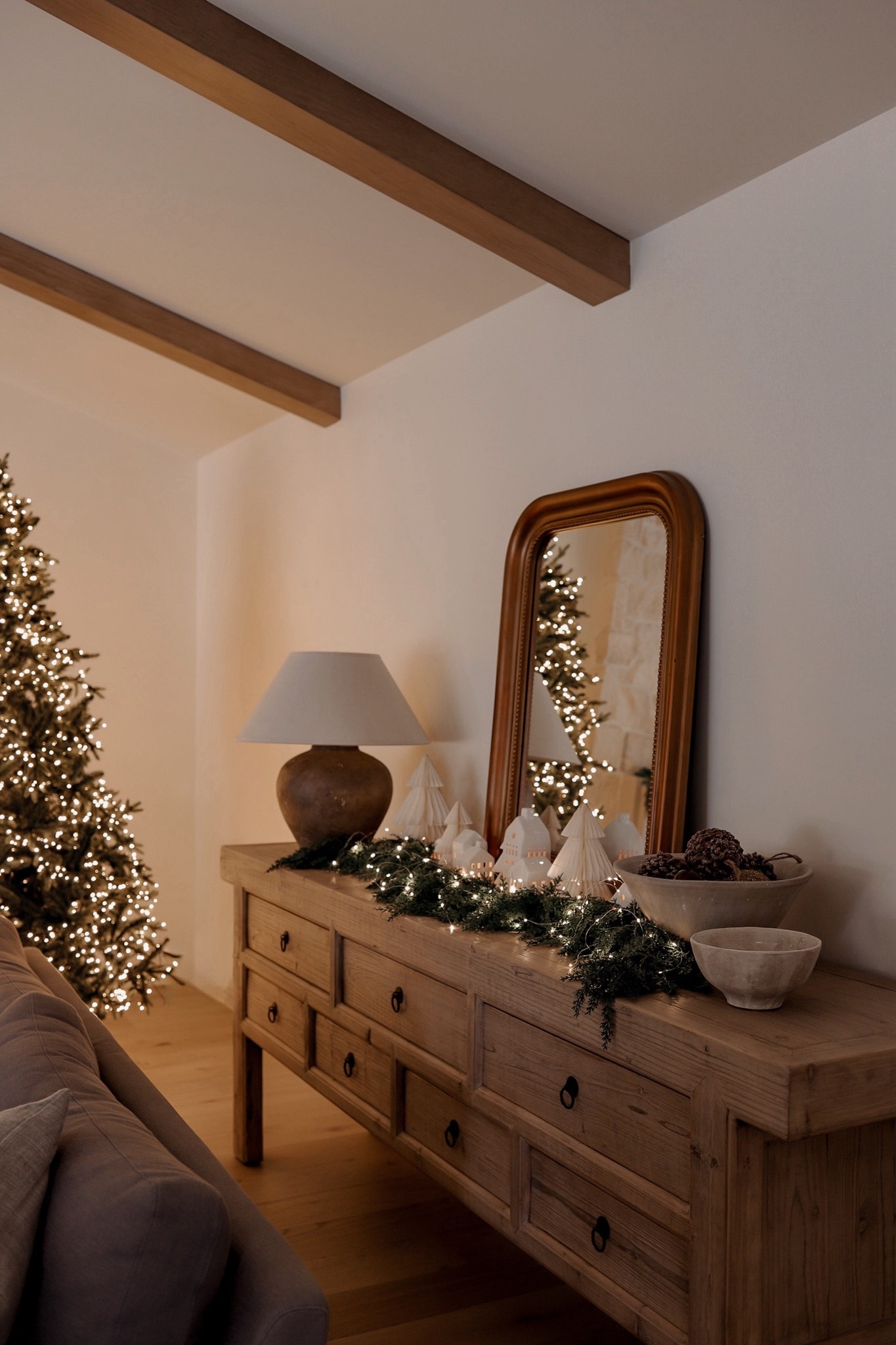 A holiday sideboard moment ✨ Layered with greenery, warm wood tones, and simple seasonal accents to make everyday spaces feel festive without feeling overdone. Everything linked below!

#LTKHoliday #LTKHome #LTKSeasonal