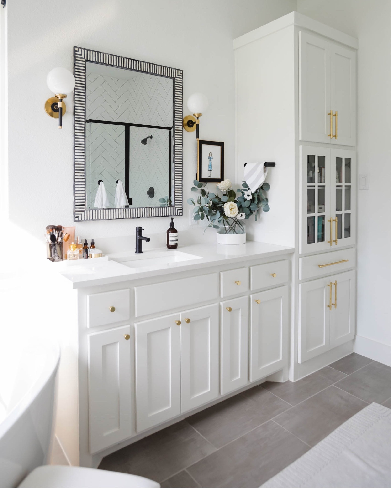 Bathroom decor with our bone inlay mirror that elevates the space. I love the striping bone tile and how it complements! On sale for 40% off for Black Friday and Cyber Monday deals

#LTKstyletip #LTKsalealert #LTKCyberWeek