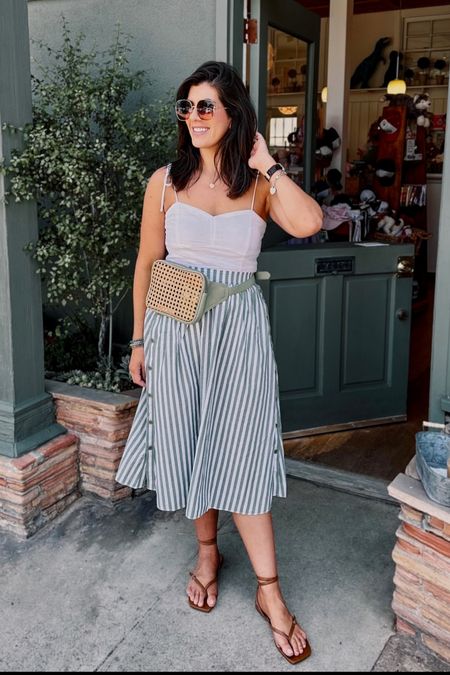 Tie linen tank- medium 
Skirt- sized down one
Belt bag- ignore the haters, it’s fabulous
Strappy sandal-sized up one 

#LTKtravel #LTKcurves #LTKFind