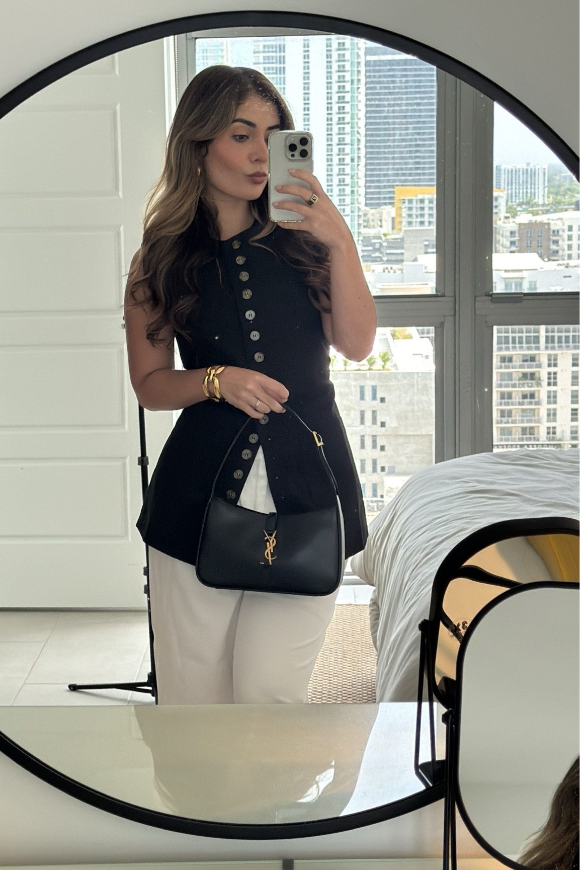 Long vest🖤 

#SummerOutfit #WhitePants #BlackTop #Miami 

#LTKTravel #LTKSeasonal #LTKStyleTip