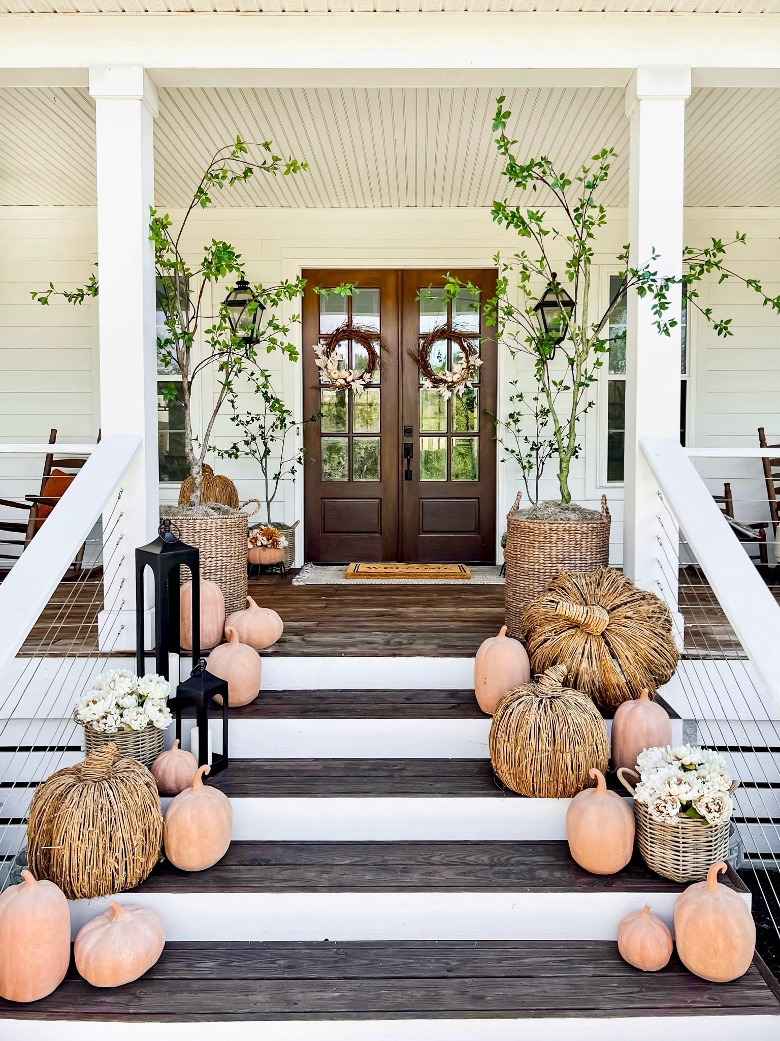 Here’s another fall porch decorating idea for 2026! This was my front doors decorated for fall two years ago in collaboration with pottery barn! It was a nice summer to fall transition with the green trees and I love these pumpkins so much!

#LTKHome #LTKSeasonal #LTKSaleAlert