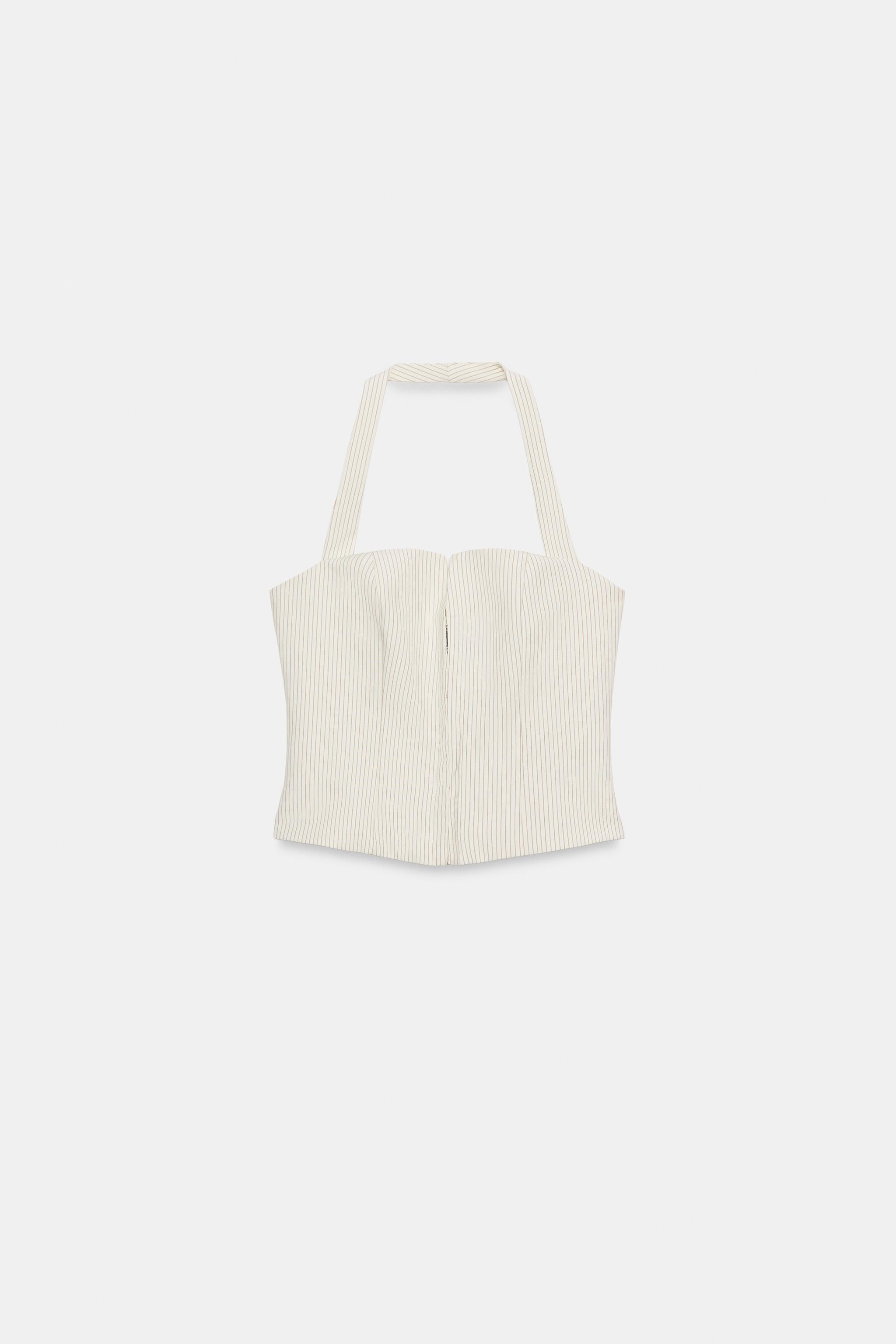 Gr\u00f6\u00dfe des Models: 181 cmNeckholder-Oberteil mit geradem Ausschnitt und Schlitz. Tonales... | Zara DE