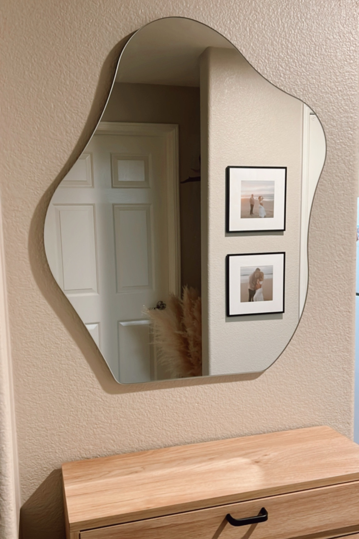 I can’t resist a good asymmetrical mirror moment 🪞

So excited with how our entryway is coming along! It’s been a challenge to navigate all the little nooks and small walls but it’s finally coming together, stay tuned for more! 

#asymmetricalmirror #entryway #bohohome 

#LTKSaleAlert #LTKHome #LTKFindsUnder100