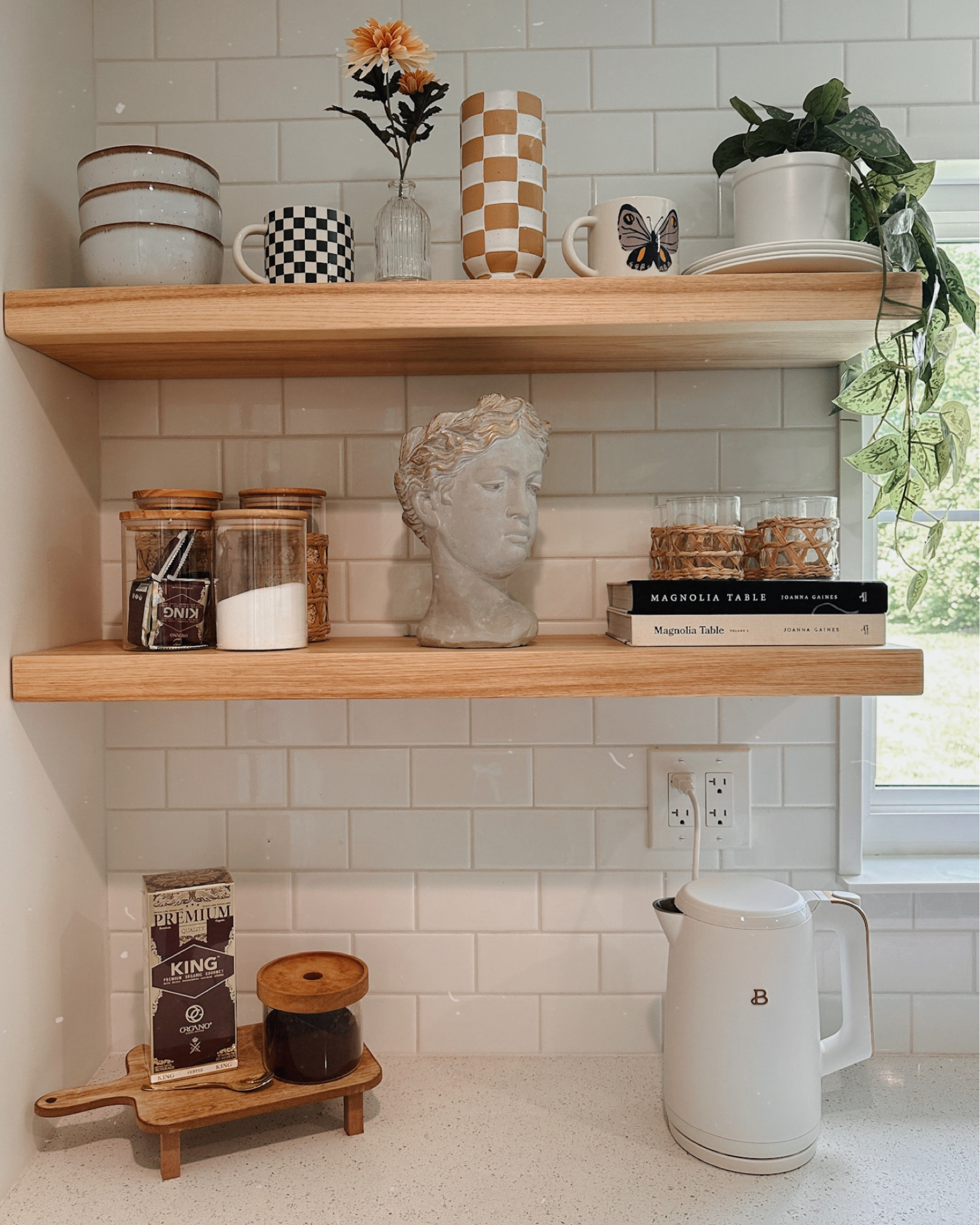 A little open shelving summer update ✨ I'm trying to simplify our decor but still have a little funky vibe. I've been loving mushroom coffee lately and this kettle makes it so easy to make it ☕️


Faux plants, opening shelving decor, floating shelves, hearth and hand with magnolia, Anthropologie bust, coffee maker, coffee mugs, checkered print, storage jars, rattan, boho style, summer dress, nursery, maternity, kitchen essentials, tea kettle, Walmart, coffee bar, patio decor, country concert, target decor, neutral tones, gold accents

#LTKhome #LTKFind #LTKxAnthro