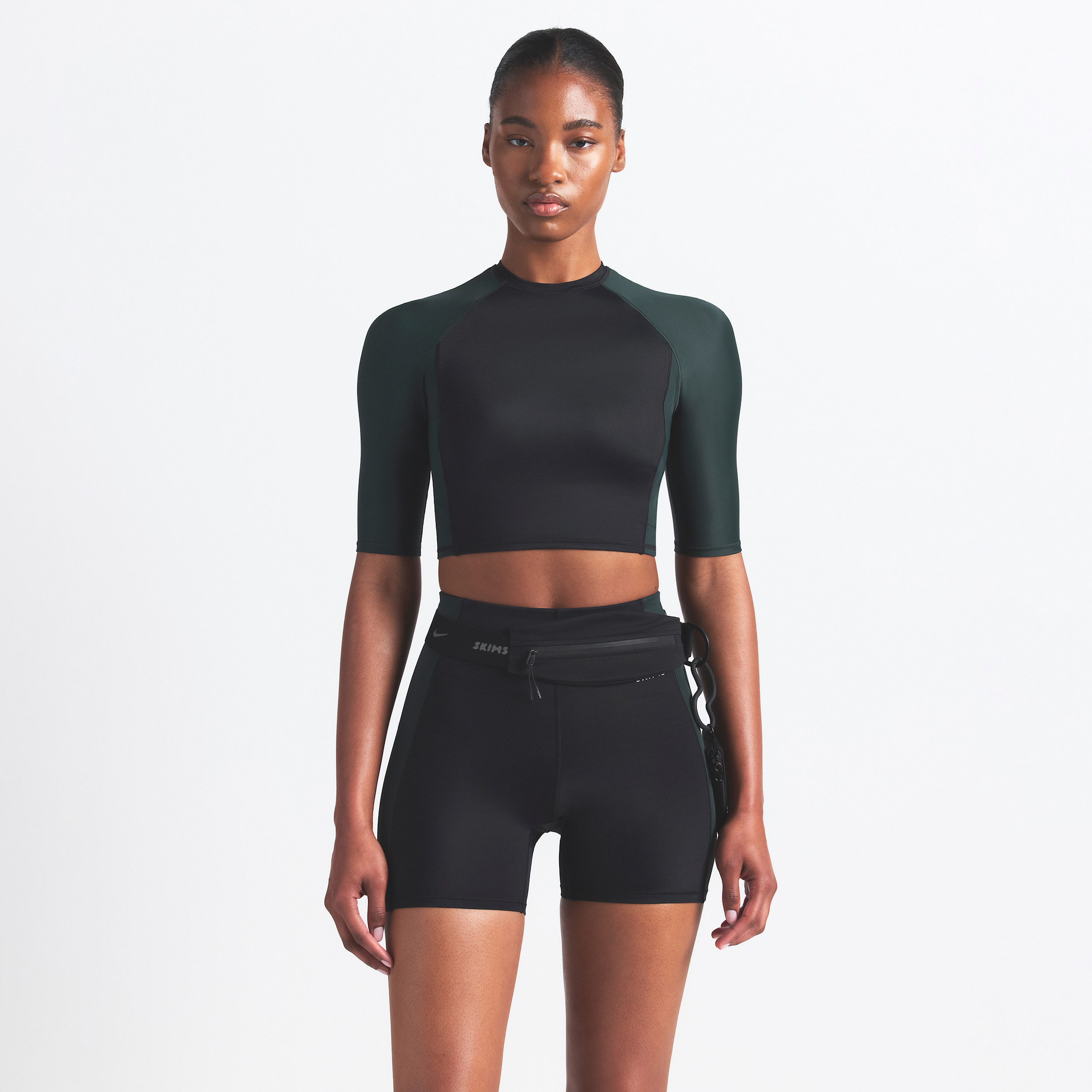 Nike Women's SKIMS Shine Padded 1/2-Sleeve Crop Top in Black | BABRA9498W-OBT | Nike (US)