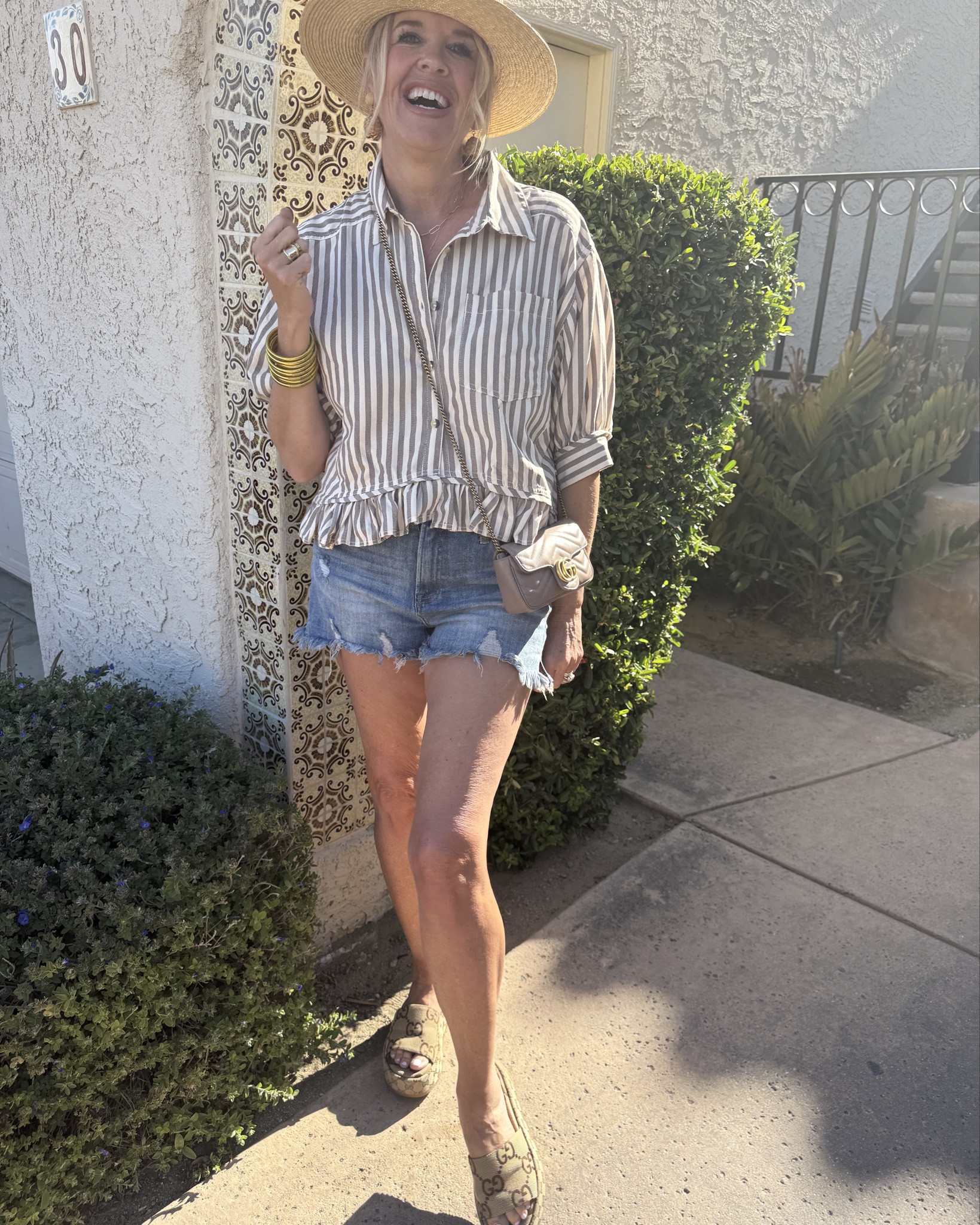 Outfit of the day…

Vacation style/palm Springs
Drinks and dinner🌴

The cutest button up stripe Ruffled bottom top with elbow length sleeve.  Under $30 fits tts 
Slightly cropped! 

Risen denim shorts .. best sellers
Back in stock, under $60 and fit tts and so good wearing a size 27

Lack of color boater hat on sale 
So good

Lisi lurch whicker earrings love love  I wear all spring and summer

Gucci bag and platform sandals 
Some of my most worn items 

Kut from kloth denim jacket 

Lip color pillow talk lip kit Charlotte tilbury 

#LTKShoeCrush #LTKFindsUnder50 #LTKStyleTip