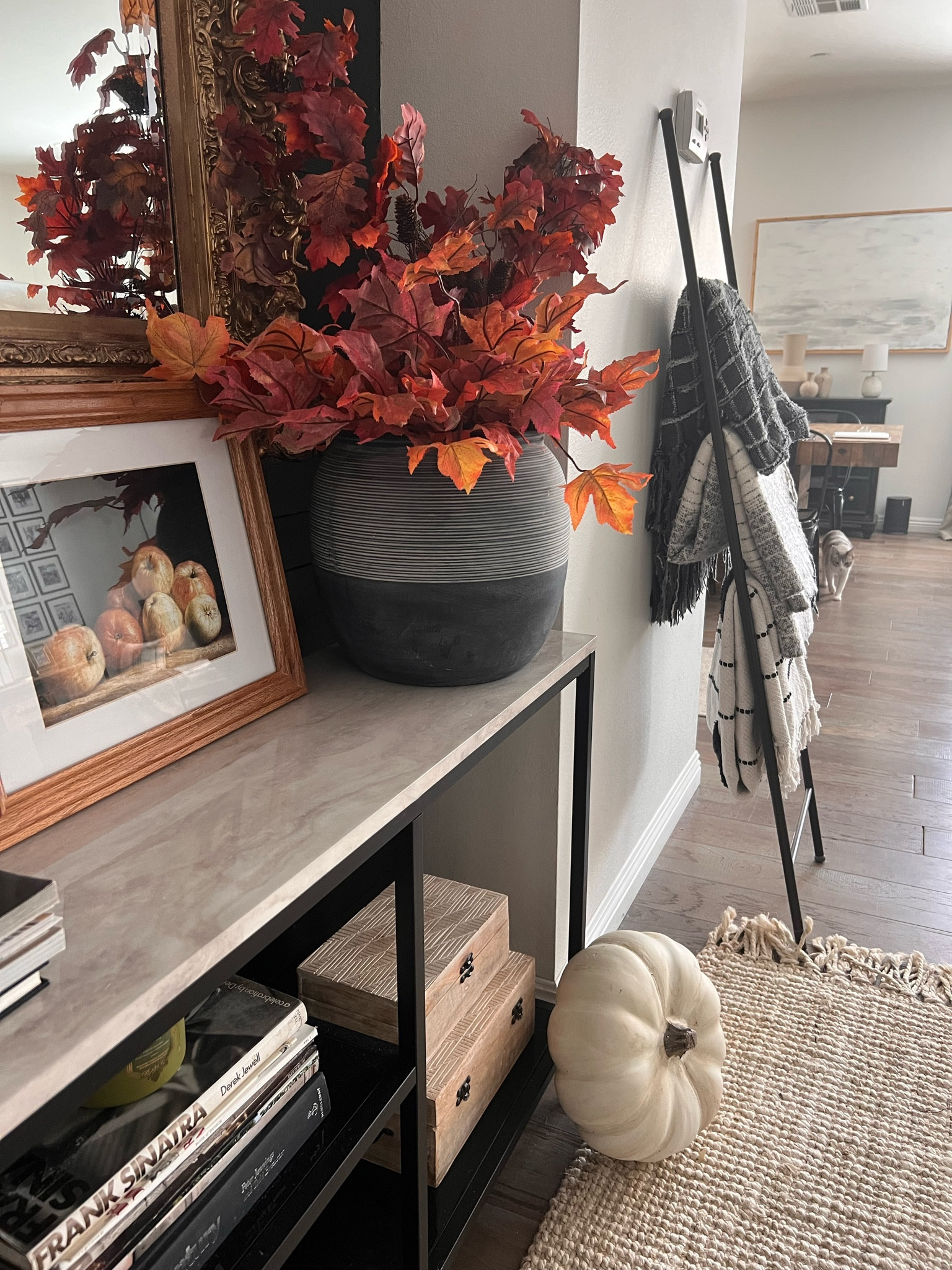 Adding a little fall to my entry way 

Faux maple leaves
Faux stems
Call decor
Fall art
Vintage art
Apple decor
Fall leaves 
Pumpkins 

#LTKSeasonal #LTKFind #LTKhome