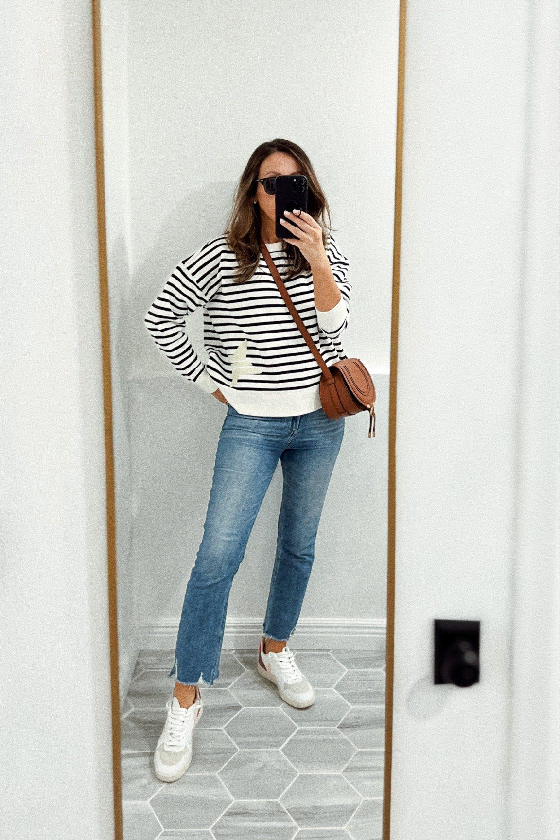 Striped sweatshirt - I sized up for a boxier fit. It already is boxy so you can stick to your size.

Jeans - tts and very comfy 

Veja sneakers- this color combo is old. Linking great alternatives


#LTKFind 

#LTKSeasonal #LTKstyletip