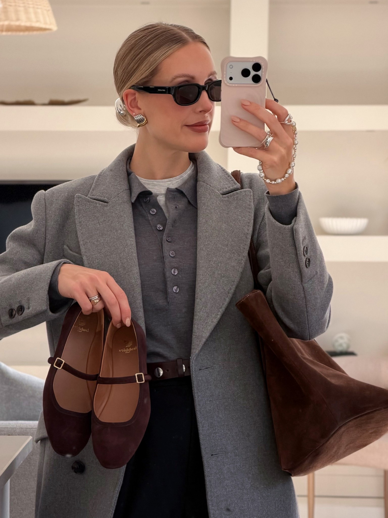 Grey and brown autumn outfit 🩶🤎 - try this trending photo colour combination for 2024 

Grey maxi coat Karen Millen
Grey polo knit Zara
Suede Mary Janes Bobbies (linked similar)
Barrel leg trousers M&S
Studded belt Massimo Dutti 
Saint Laurent sunglasses

Workwear smart casual chic office outfit 