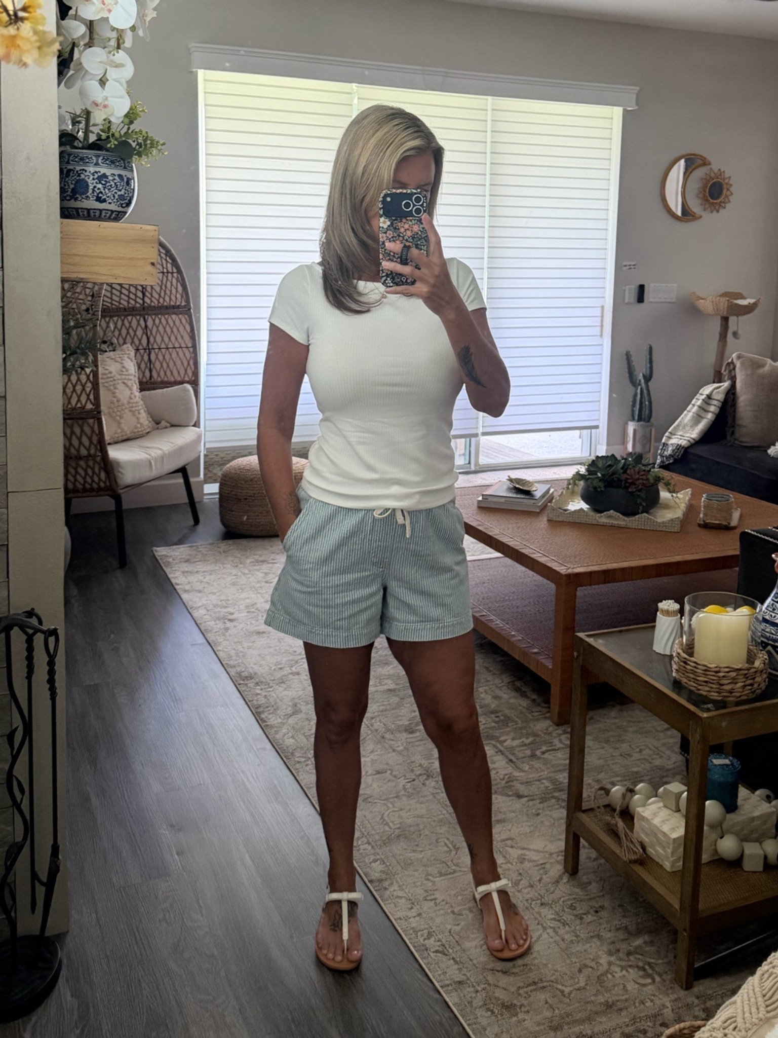 Summer shorts and cute sandals. I love linen for summer but found these cute light denim with drawstring shorts paired with a basic white tee or tank, and white or blue sandals #shorts #sunmerstyle #basictee #bowsandals #summersandals #vacationstyls

#LTKootd #LTKOver40 #LTKSeasonal