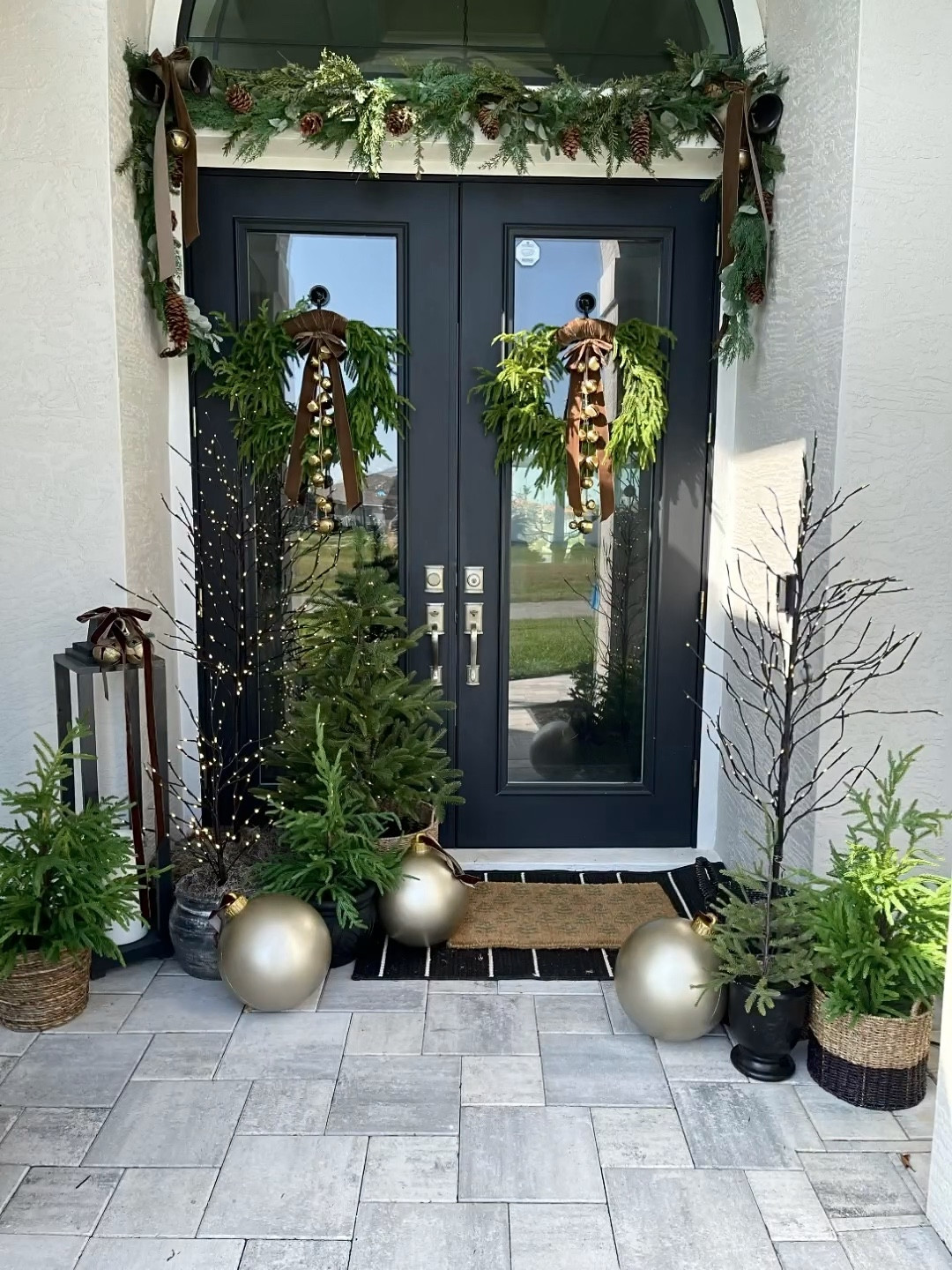 Christmas Porch
Christmas trees, Christmas tree mat, large outdoor ornaments, LED Greg trees, garland, Norfolk pine wreath, brown velvet garland
#founditonamazon #michaelsstores

#LTKSeasonal #LTKGiftGuide #LTKhome