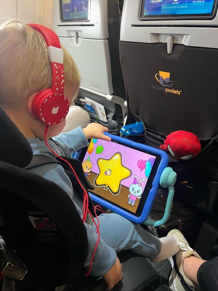 The best travel car seat! So easy to travel with and keeps Jack safe! 
We love the airplane pockets! First time using them and I will never fly without them now! Perfect for keeping everything together! Jack has his favorite game and Tonie headphones. 

#LTKbaby #LTKkids #LTKtravel