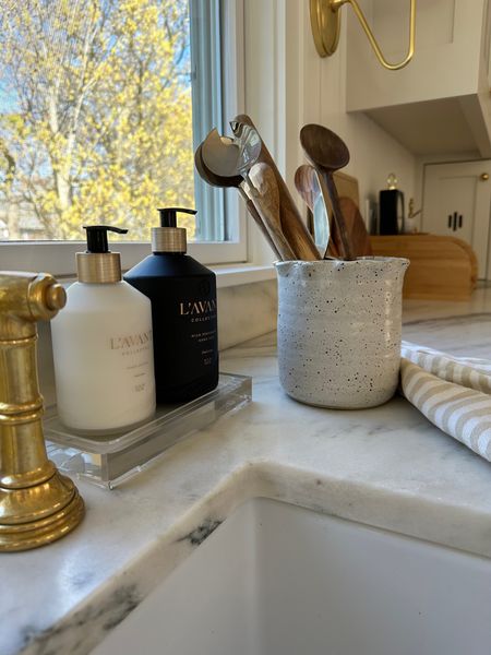 My favorite sinkside duo and the perfect Mother’s Day gift — the L’AVANT hand soap and lotion with lucite tray. Their clean products and fresh linen scent are my absolute favorites for elevating the everyday. 

Shop the look and follow @pennyandpearldesign for more home style ✨

#LTKGiftGuide #LTKstyletip #LTKhome