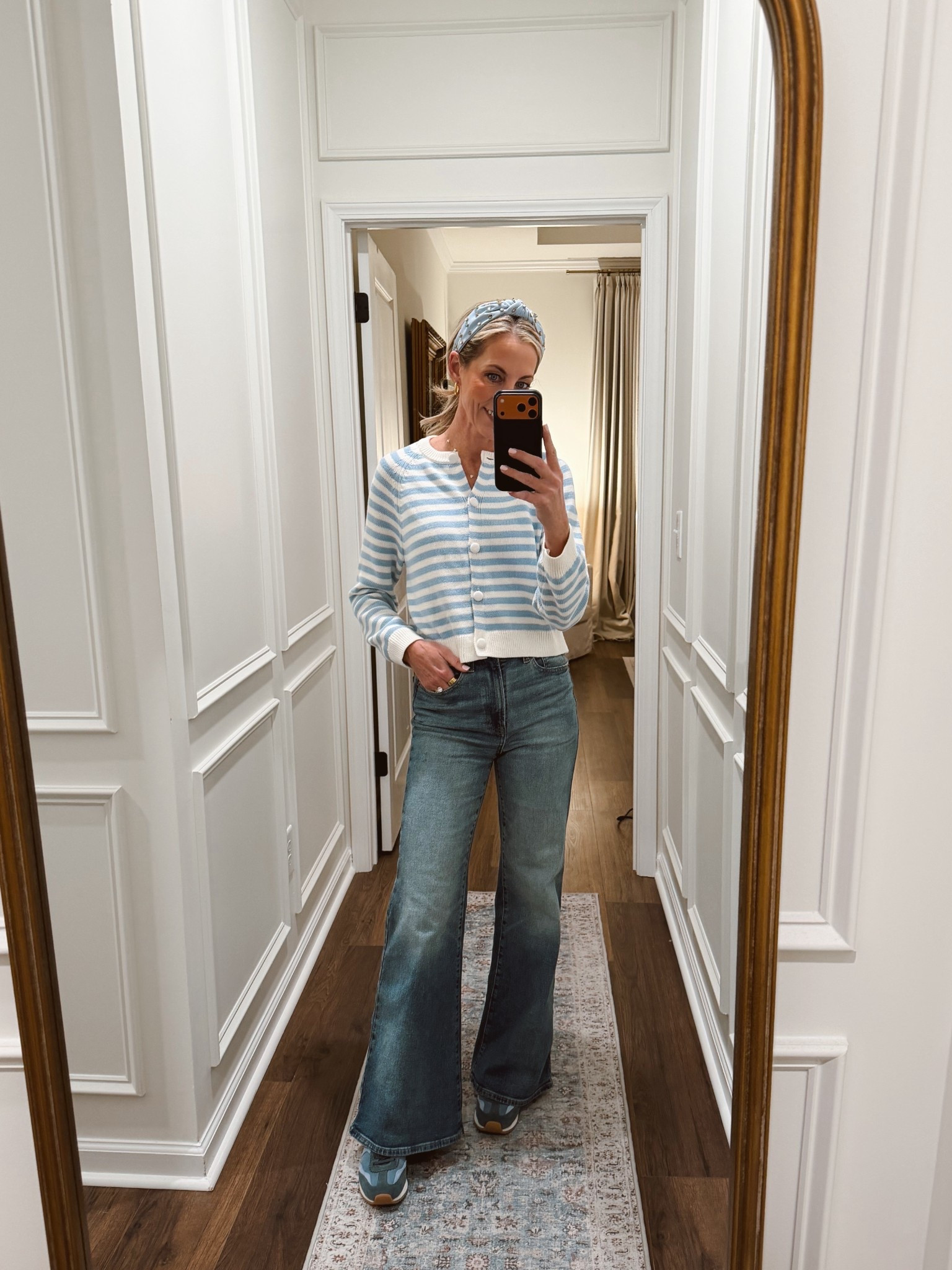 Women’s crewneck cotton cardigan from universal threads is a wardrobe stable but never goes out of style wearing a size small partially unbuttoned for a casual ease paired with my favorite high-rise 70s flare denim from target size small and the sweater size 2 in the jeans

#LTKootd #LTKdayinmylife #LTKgrwm