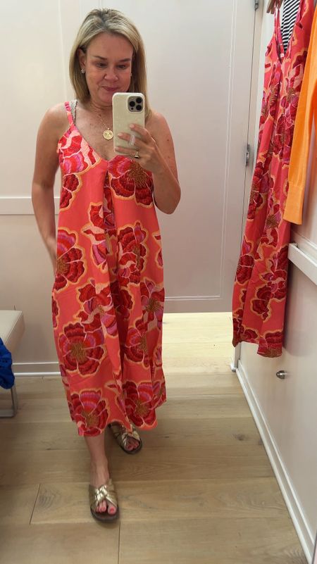 Love the latter of this flowy sundress. Perfect for beach dinner or vacation. Size down a size or two!  This is a 0 petite and I still have a tiny bit of room under the arms. Normally a 4-6. 