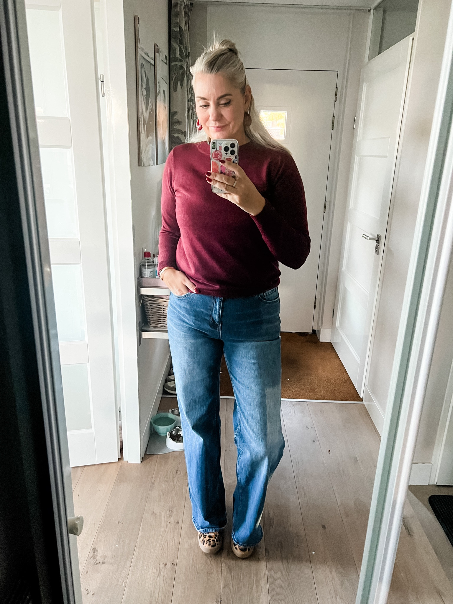 Ootd - Tuesday. A soft tall specific burgundy jumper over the best basic white t-shirt paired with wide legged blue jeans (Shoeby) and leather leopard print sneakers. 



#LTKnederlands #LTKautumn #LTKeurope