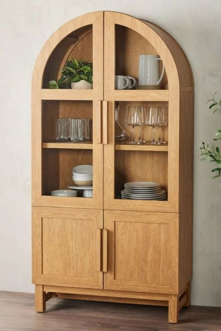 Walmart has a arched cabinet like my black one and it’s only 399 check it out now. #archedcabinet #bookshelf #bar #storage #decor #homedecor #walmart 

#LTKSeasonal #LTKhome #LTKstyletip