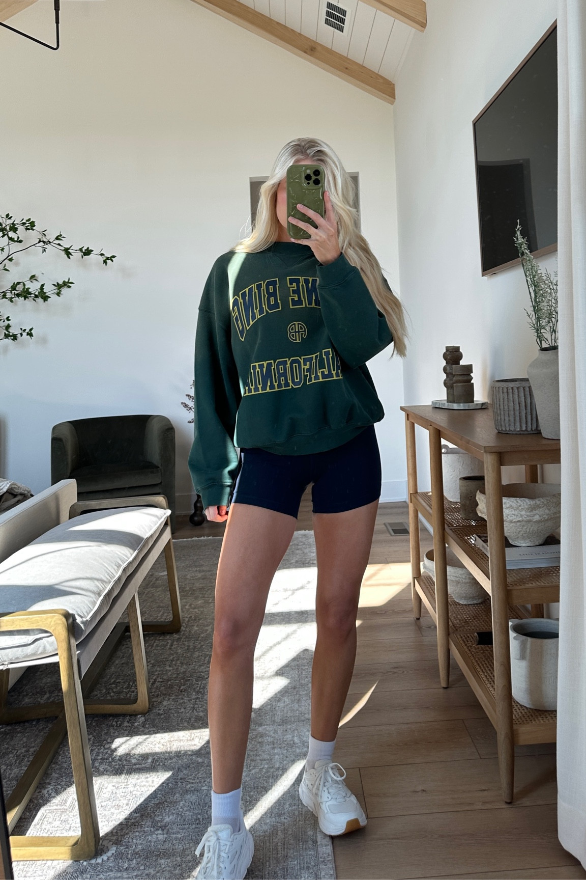 Small in shorts & sweater. True size in shoes! 