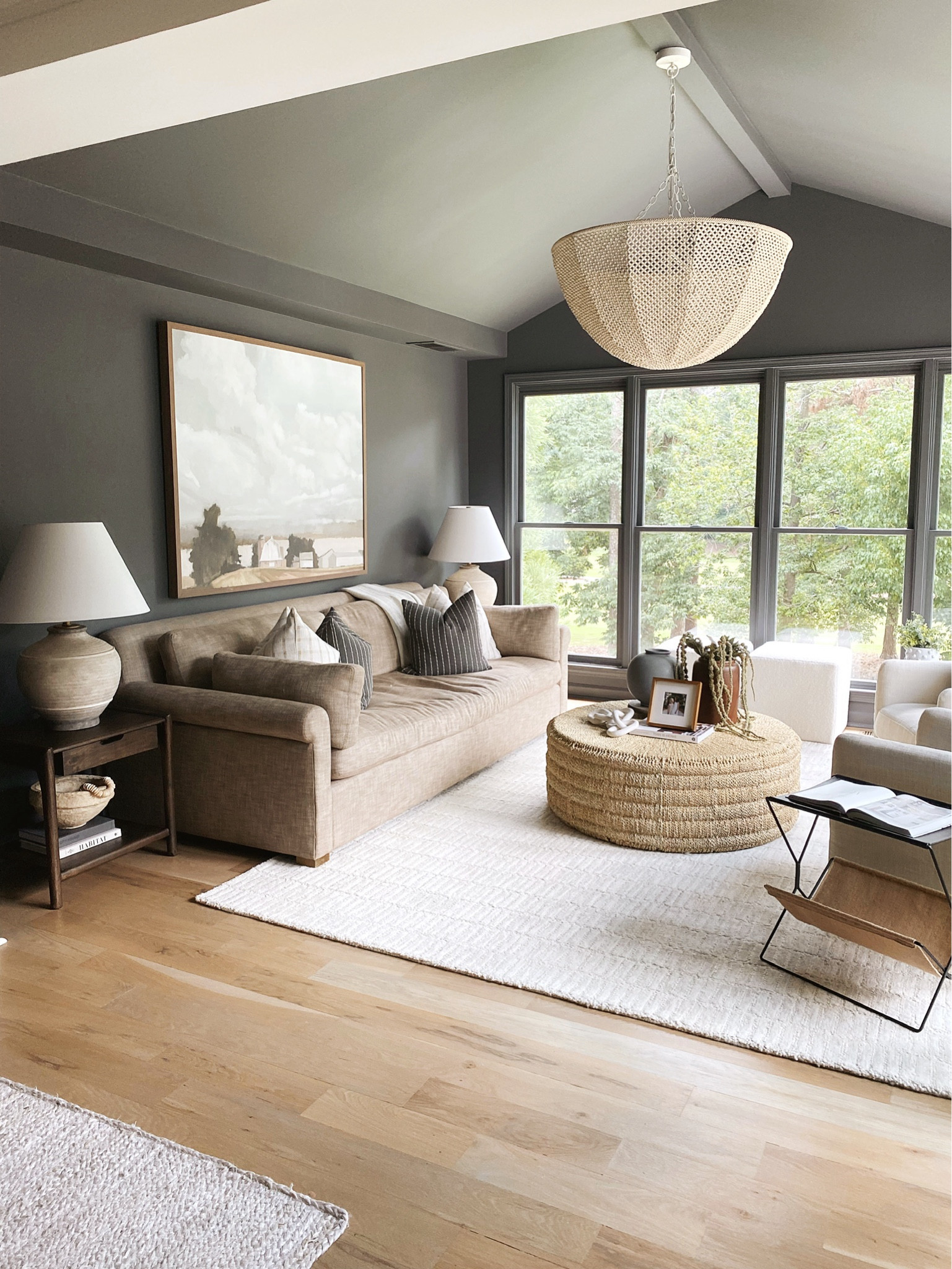 Sunroom inspo, living room inspo, moody paint, large artwork, round coffee table, neutral home redecoration, cozy living room 

#LTKStyleTip #LTKSaleAlert #LTKHome