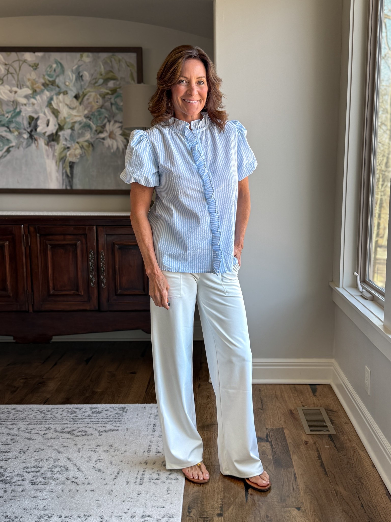 Flattering Spring Top for Women Over 50 | Amazon Ruffle Sleeve Blouse

If you want detail without bulk, this top does it right.

The subtle ruffle trim adds softness, while the tailored fit keeps everything streamlined through the torso. Paired with white wide-leg pants, this becomes an easy elevated everyday look.

✔ Adds shape without clinging
✔ Soft sleeve detail balances shoulders
✔ Lightweight for spring and travel

This is an Amazon find that works beautifully for women over 50 who want feminine structure.

#stripedblouse #casualoutfit #springtransition #springtop