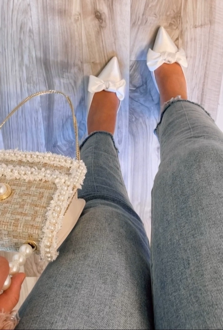 Bow heels, Pearl handle tweed bag, paired with my fave pair of frayed hem cropped denim jeans— perfect dressy casual spring summer look! I personally love a a cute bow heel, added a few of my favorites bow heels along with my fave spring/summer bag! 

Found my all time favorite, go-to pair of ankle cropped jeans! They are these Kensie brand that I linked 3 colors in. I have them in every color possible and find them all at tj maxx/Marshall’s, Nordstrom rack online also sells them so I’m finally able to link them 😍 they run big and are so stretchy so definitely size down. I wear a size 6/8 in them for reference.