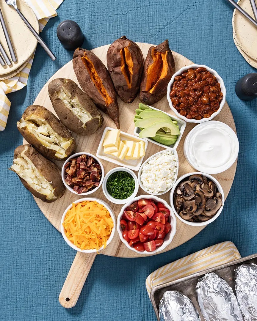 If you think there’s something better than a loaded baked potato, you haven’t tried a baked potato toppings bar. If you really want to blow your guests minds, serve this potato bar as a delicious, loaded appetizer! There are so many ways to serve it: Whether you go for sweet or russet potatoes, you can mash ’em’, bake ‘em, fry ‘em, bake ‘em twice…you name it! There’s really no wrong way to serve a potato–especially with all these toppings.

#LTKSeasonal #LTKfoodie #LTKHome