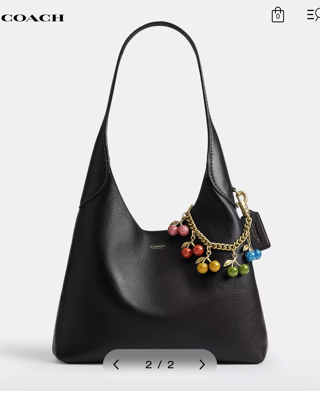 Coach rainbow cherry bag chain 🍒🌈✨ she is stunning yall! #coachcharm #coachcherry #bagcharms #coach