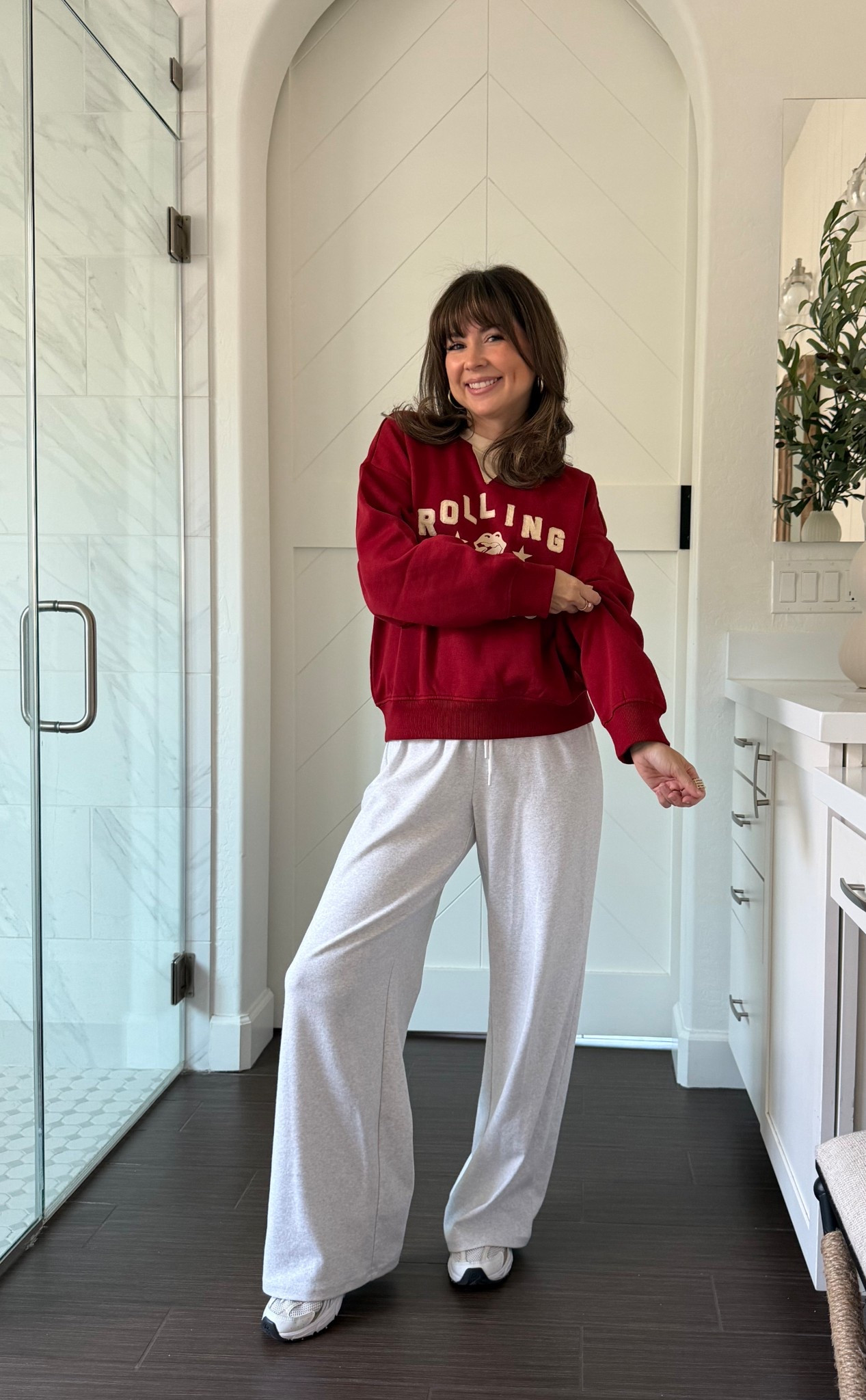 Lounge outfit for indoors or running errands. This Rolling Stones sweater with lounge pants and sneakers super comfortable. 

#LTKPetite #LTKTravel #LTKHoliday