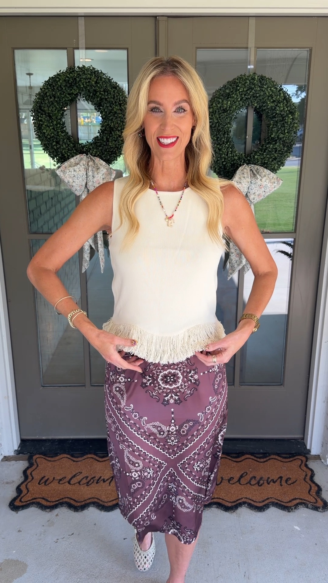The cutest fringe sweater tank top and paisley print skirt! Use code AMYANN15