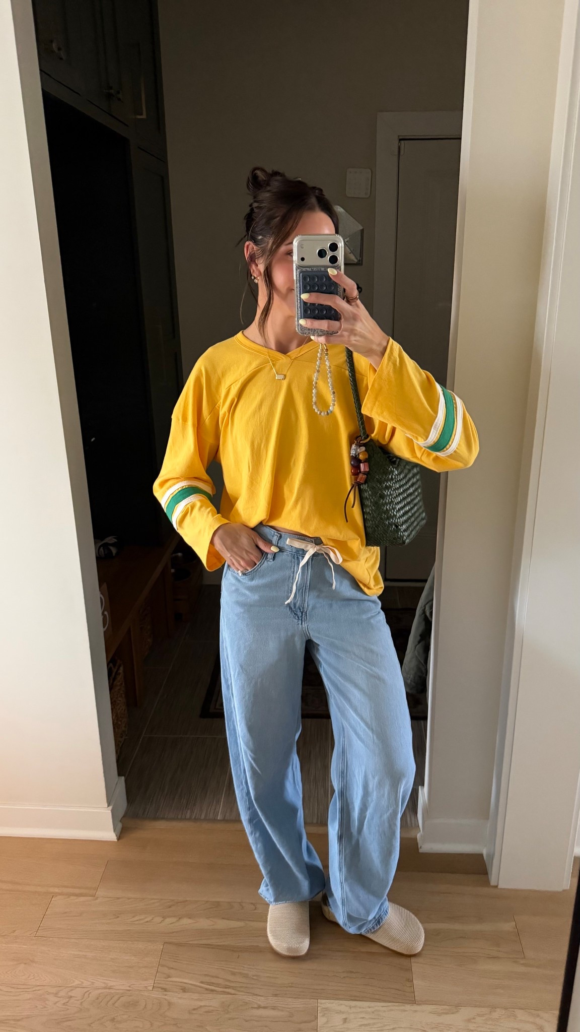 Hockey tee: tts (S) 
Jeans: size down (25) 
Clogs: size down 

#LTKSeasonal #LTKootd #LTKmomlife