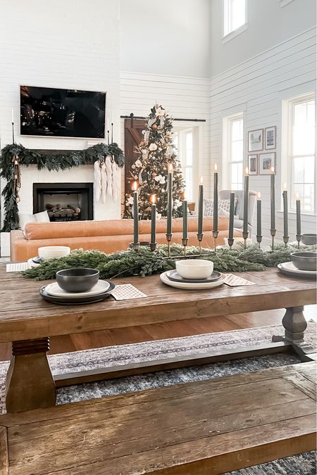 Christmas and holiday living room decor tree picks garland mantel mantle cedar and eucalyptus garland bells two tone place settings holiday tablescape candelabra taper candles wood farm table and benches dining room open concept living and dining kitchen white knit long stockings modern farmhouse style

#LTKHoliday 

#LTKhome #LTKstyletip
