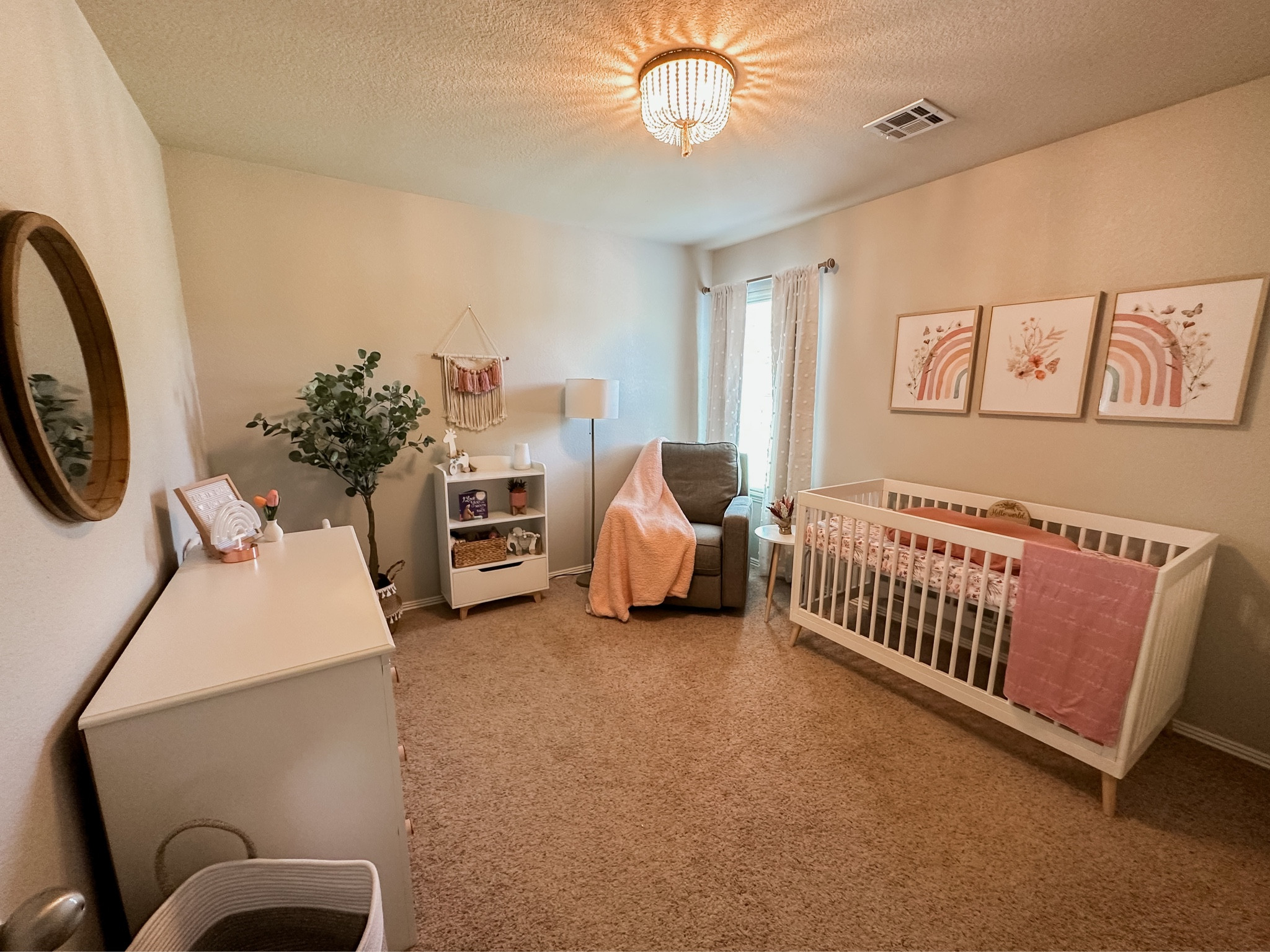 Boho nursery for baby girl💗 

Boho, boho nursery, nursery, rainbows, wicker, baby, white, natural, baby girl, floral, greenery, pink, pink and white, affordable, budget, crib, recliner, rug, Nanit camera, snuggle me, 

#LTKbaby #LTKhome #LTKkids