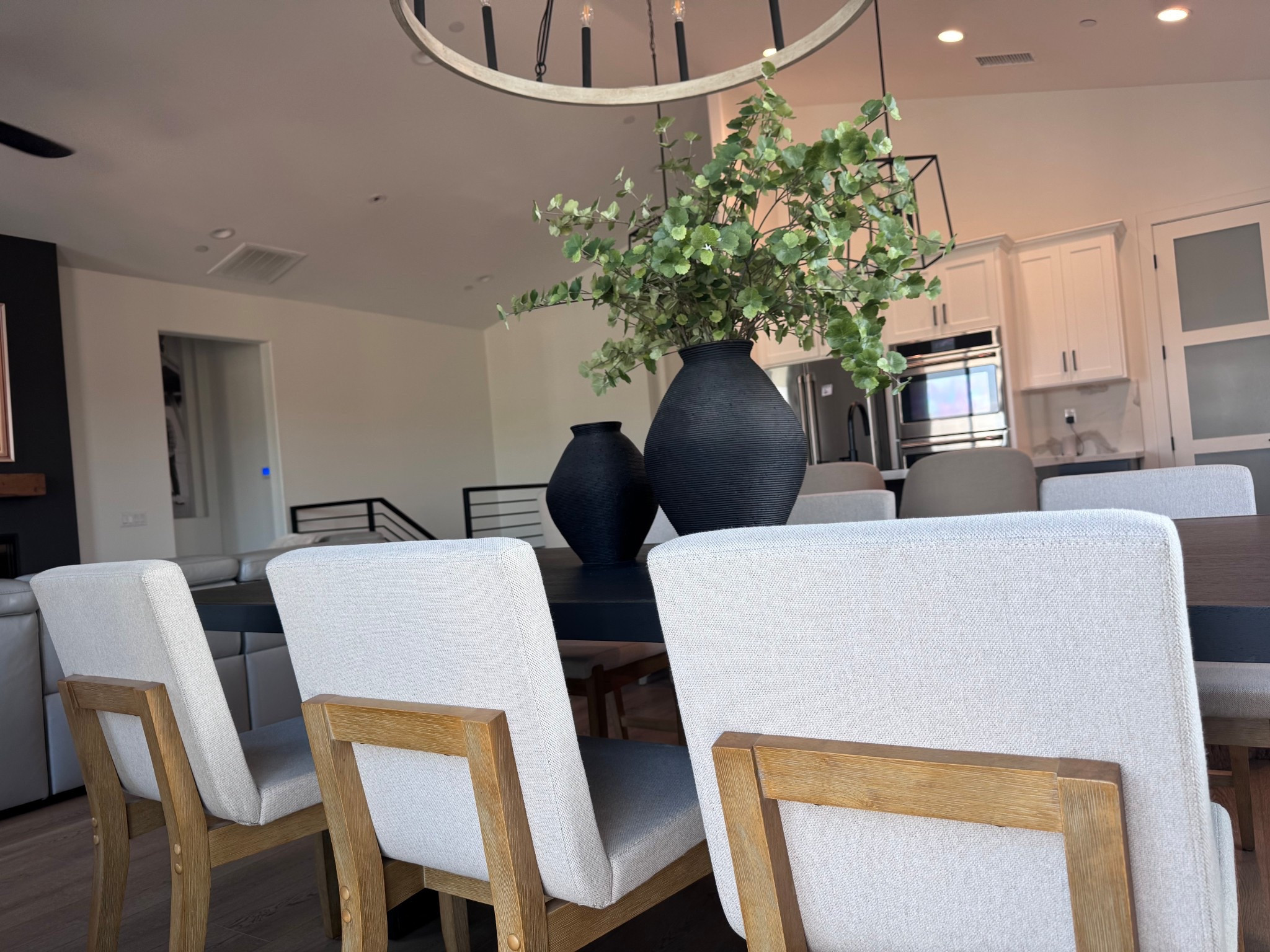 Dining room chairs | black wood table | chandelier | vase | botanicals 

#LTKU #LTKHome #LTKdayinmylife