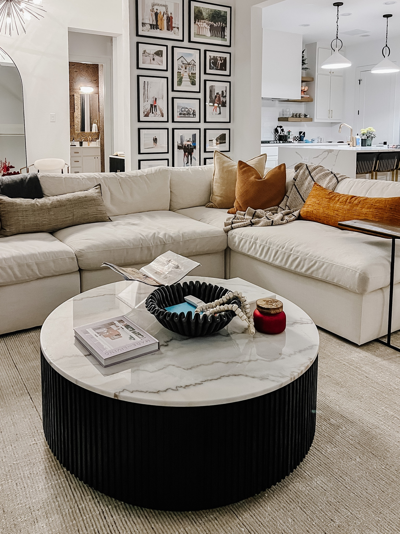 My new coffee table from Arhaus Finley collection is an absolute favorite of mine! I love the roundness it gives and feel like it makes the space warm and inviting. Great quality with a marble top, wood finishes and brass touches! 

#LTKstyletip #LTKhome