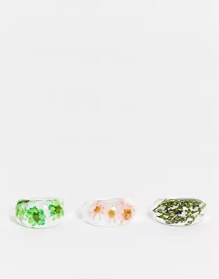 ASOS DESIGN pack of 3 rings with trapped flowers in clear plastic | ASOS (Global)