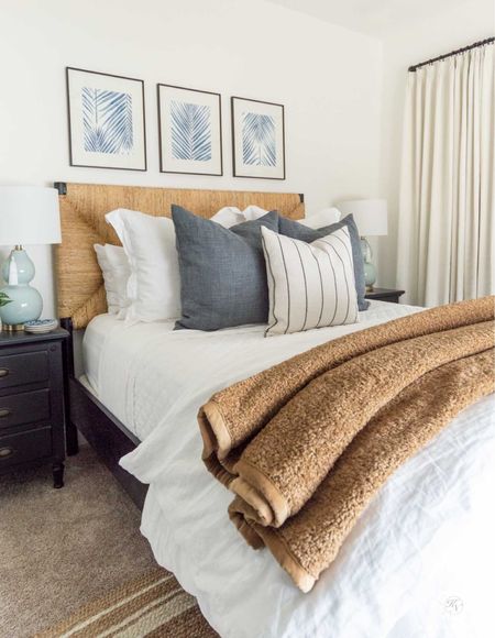 An easy DIY wall art idea is to frame wallpaper remnants, like I did above the bed in our blue and white guest room. home decor bedroom decor white bedding teddy bear throw black nightstand black matted frame

#LTKfindsunder50 #LTKhome #LTKstyletip
