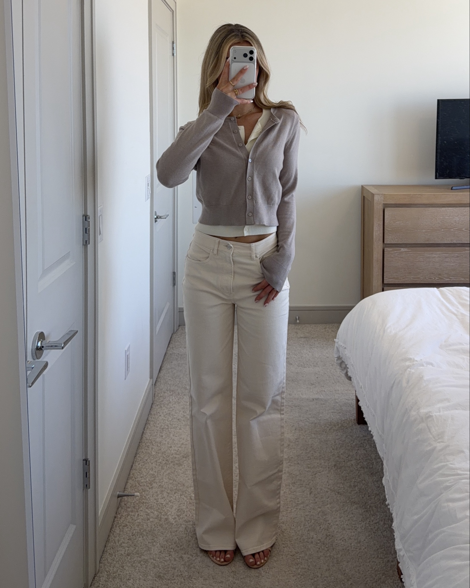 styling cream wide leg jeans for the office 💐 also love the double layered cardigan look for spring!

#LTKootd #LTKWorkwear