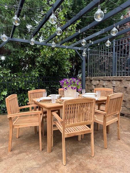 Beautiful eco-friendly seven piece teak dining set. Transform your outdoor living space with this solid sustainable table and chair set. Perfect outdoor furniture for gathering with family and friends. @shop.ltk #liketkit #liketkit/vivaterra_

#LTKstyletip #LTKSeasonal #LTKhome