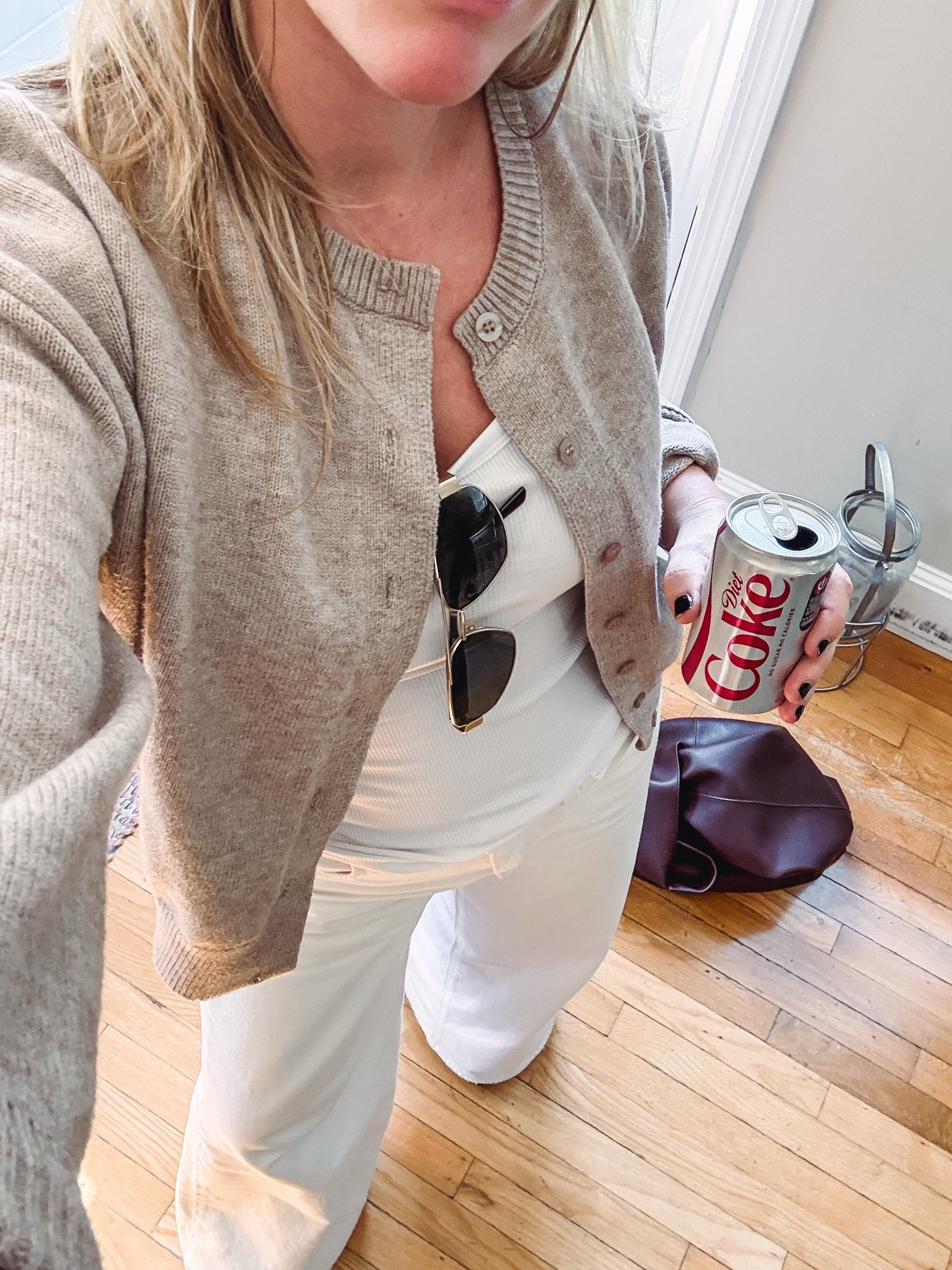 Love me ecru denim crisp white tank 
Wearing LONG option on the tank 
Been wearing this taupe cardigan all spring 
Geometric metal aviators

#LTKootd #LTKSaleAlert #LTKWorkwear
