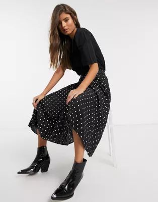 Stradivarius pleated midi skirt in black with white dots | ASOS US