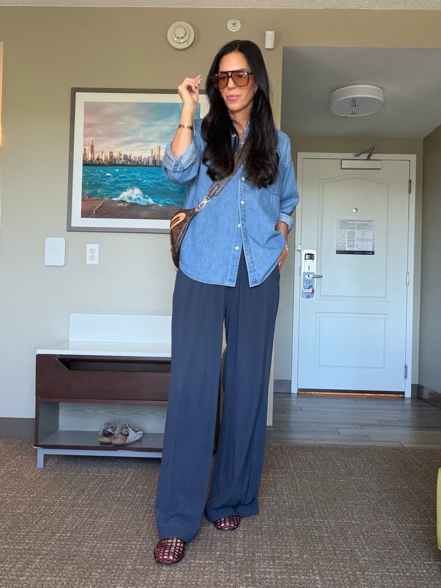 Day 1 of mom outfits for a sports weekend away. 
@Vuori US  villa pants - small tall 
@Aritzia denim shirt - small 
@Anthropologie jelly shoes that are insanely comfortable! 
@Thatch Jewelry  necklace