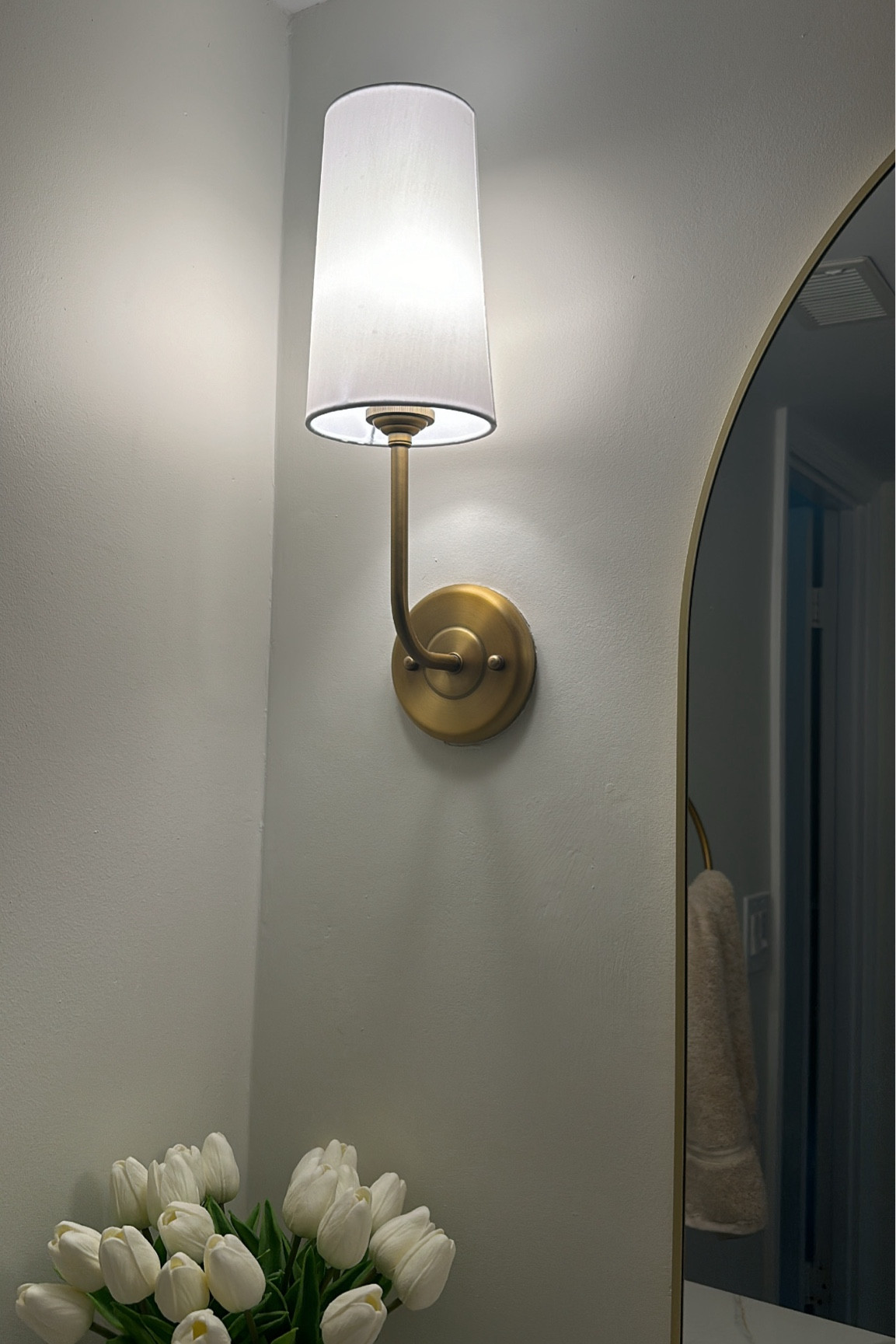 Light sconces are a must!! Love these ones in my master!