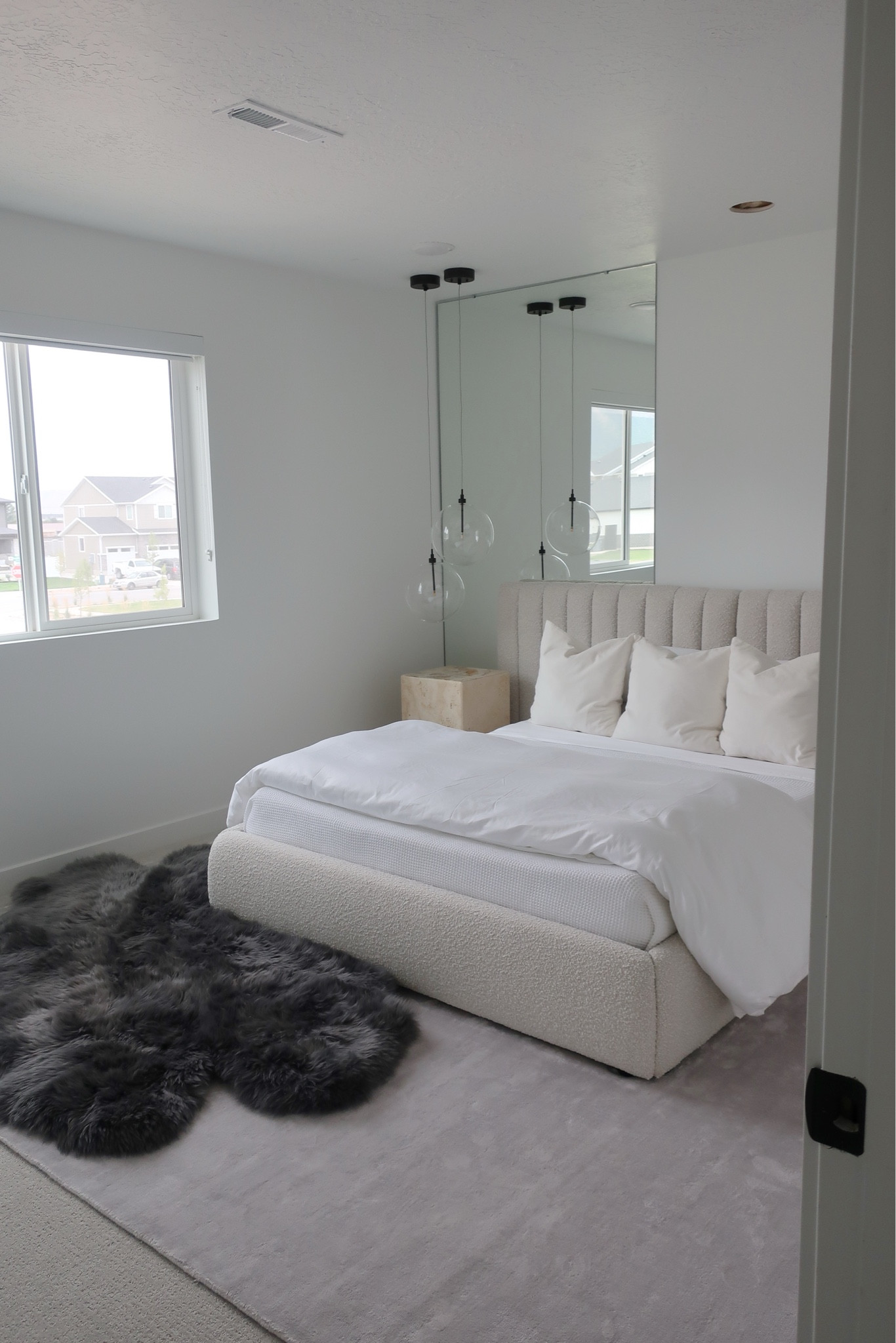 Bed: Rove Concepts Berlin Bed
Sheepskin: Overland
Mirror: Custom from Dulles Glass