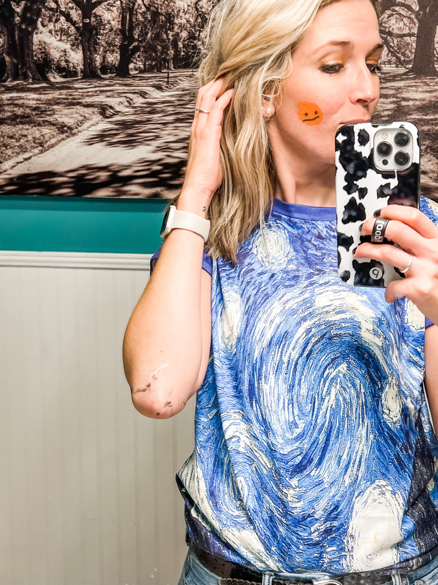 Not so glamorous but…. I survived my first elementary school fall festival. We had the longest line the whole night! I felt like a celebrity 🥹 Since I was the Art teacher we got to face paint! This pumpkin on my cheek was extra special because my six year old daughter did it 🎃 also… The Starry night shirt was a HUGE hit. Lots of Van Gogh fans out there! 

#LTKfamily #LTKHalloween #LTKunder50