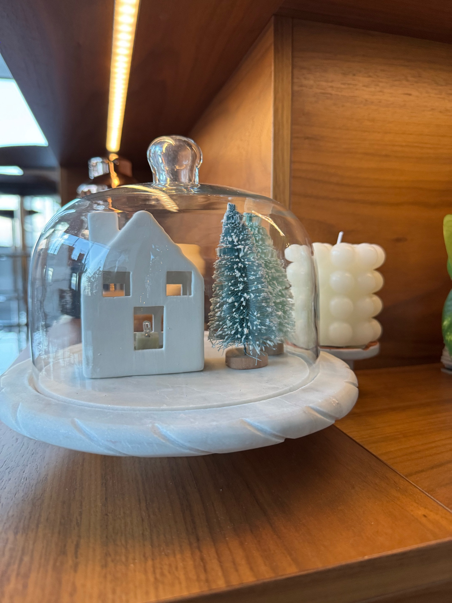 Made a “winter snow globe” with my cake stand & holiday decor. 

#LTKHoliday