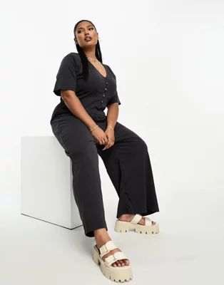 ASOS DESIGN Curve jersey button front chuck on jumpsuit in washed black | ASOS (Global)