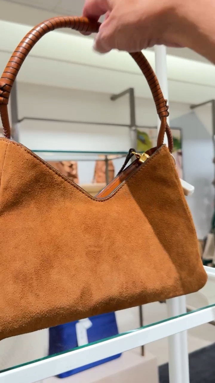 In love with this Staud bag on sale at Nordstrom!! I was eyeing it in olive, but I love brown too! Which would you choose?

#LTKSaleAlert